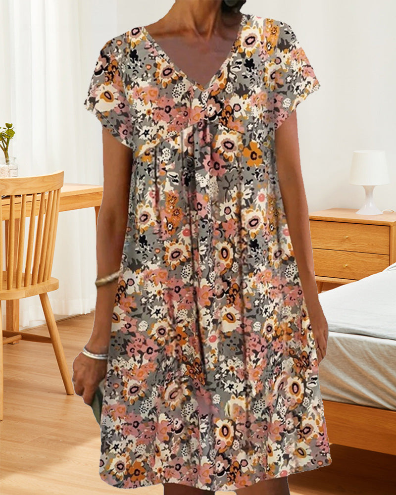 Hedy - Oranje Bloemen Jurk