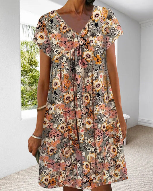 Hedy - Oranje Bloemen Jurk