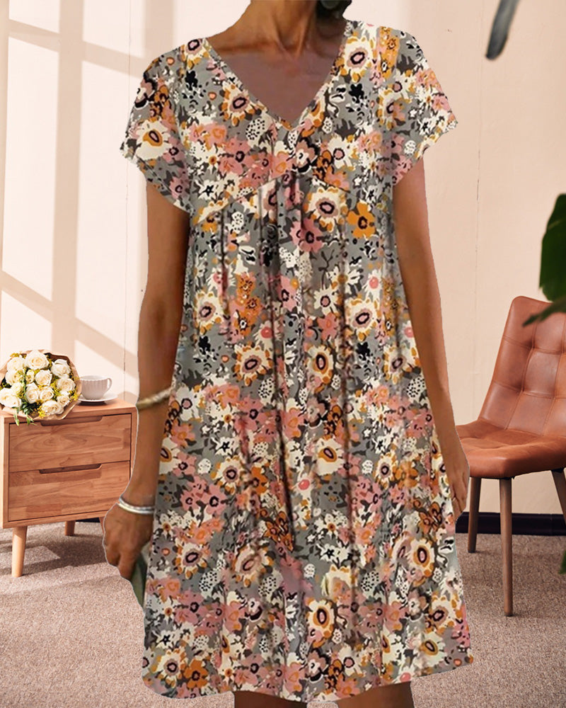 Hedy - Oranje Bloemen Jurk