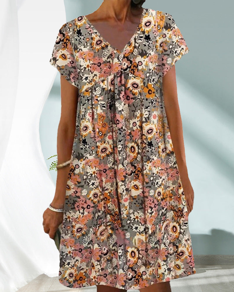 Hedy - Oranje Bloemen Jurk