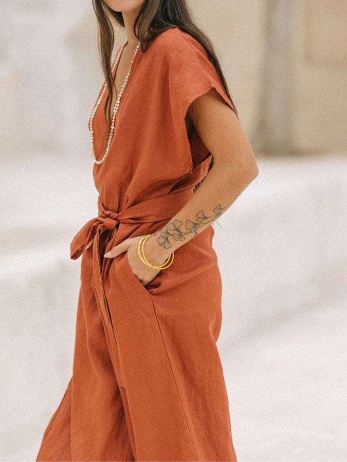 Stijlvolle Vintage V-hals Jumpsuit met Cross-Tie