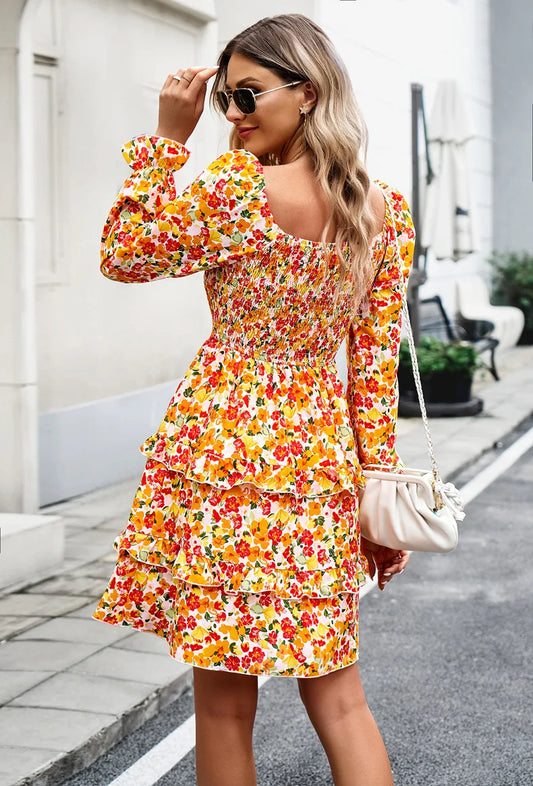 Marjoleine - Oranje Bloemenjurk