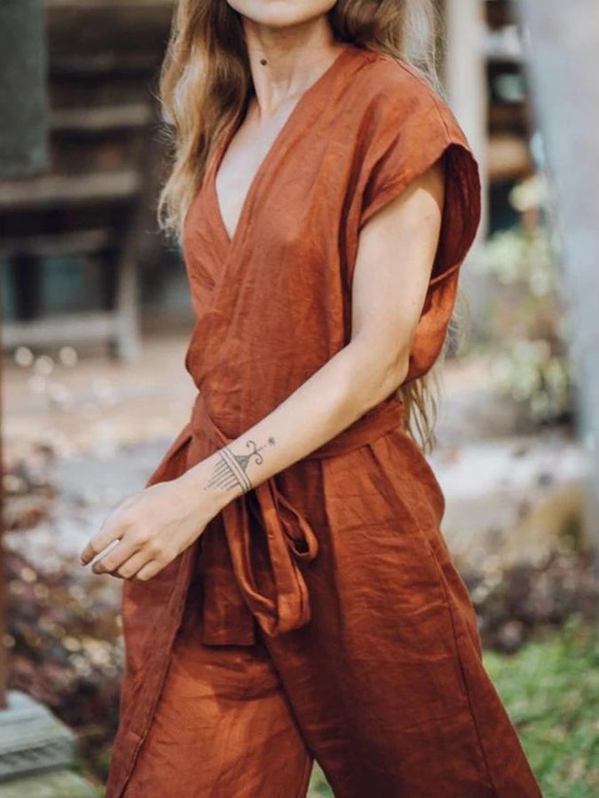 Stijlvolle Vintage V-hals Jumpsuit met Cross-Tie