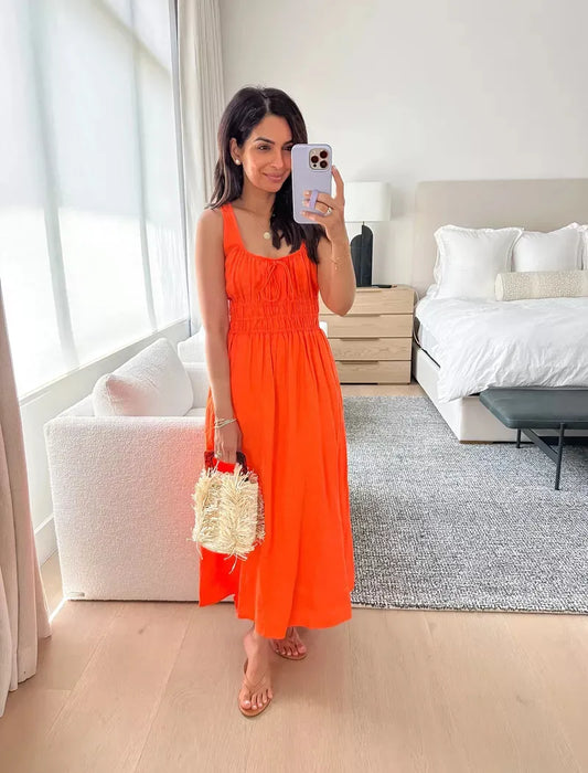 Karianne - Oranje Gesmokte Jurk