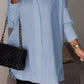 Elegante oversized overhemdblouse met opgerolde mouwen