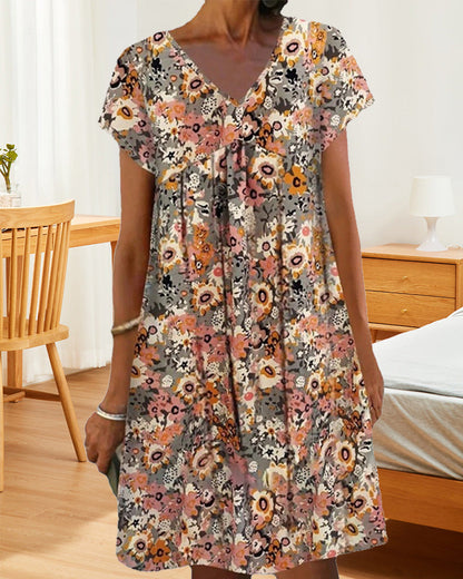 Hedy - Oranje Bloemen Jurk