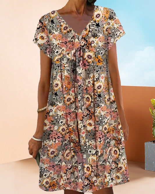 Hedy - Oranje Bloemen Jurk