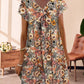 Hedy - Oranje Bloemen Jurk
