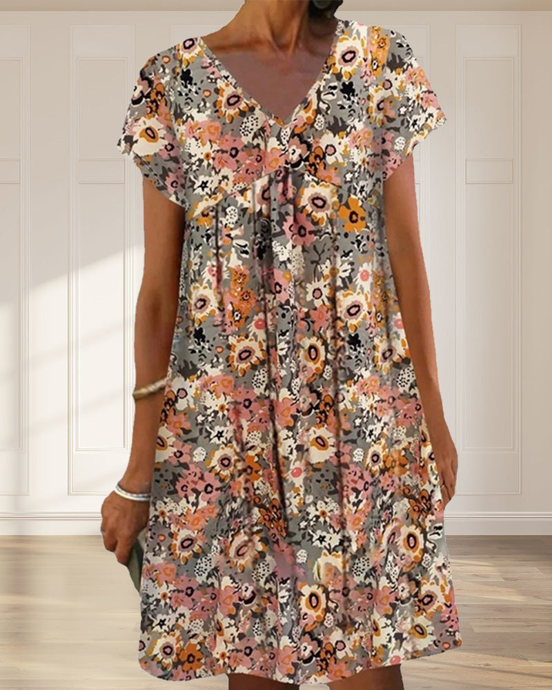 Hedy - Oranje Bloemen Jurk