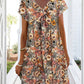 Hedy - Oranje Bloemen Jurk