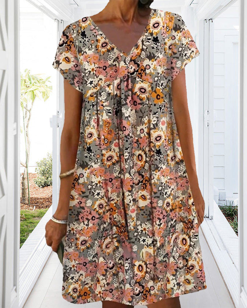 Hedy - Oranje Bloemen Jurk