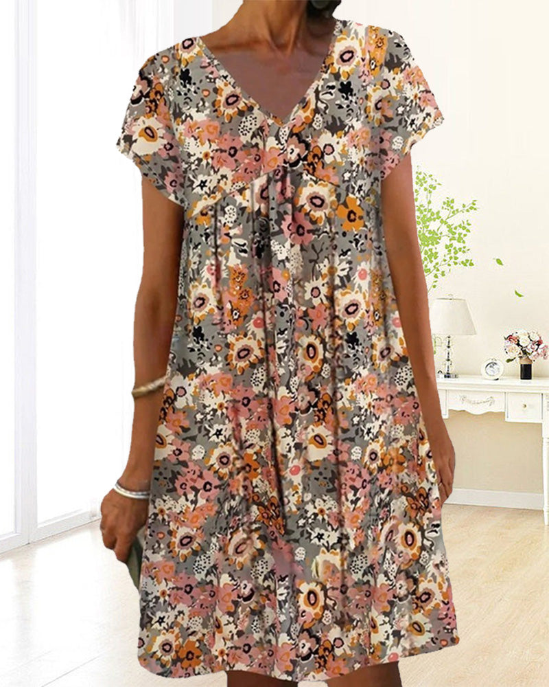 Hedy - Oranje Bloemen Jurk