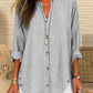 De charme van nonchalance: losjes gesneden gestreepte blouse