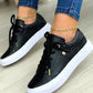 Chique sneakers met gouden detail