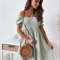 Eva's Beige Off-Shoulder Smockjurk