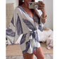 Cory - Witte Diepe V-hals Jumpsuit