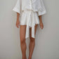 Carrie - Witte Zomerse Romper met Riem