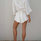 Carrie - Witte Zomerse Romper met Riem