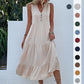 Chique Jurk met Gelaagde Zoom en Knoopdetails