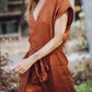 Stijlvolle Vintage V-hals Jumpsuit met Cross-Tie