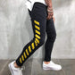 Zwarte Jeans met Gele Strepen - Noah